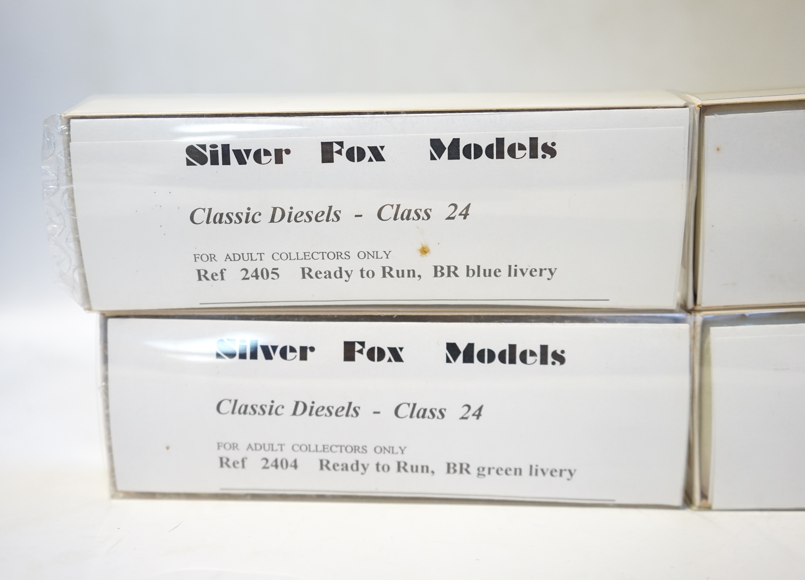 Four boxed Silver Fox Models N gauge BR Bo-Bo diesel locomotives - two Class 24 locos; one in dark green livery, D5102, and one in red and grey, 97 201, and two Class 27 locos; both in dark green livery, D5364 and 27 037